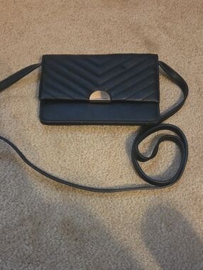 Black Quilted Crossbody Bag with Gold Accent